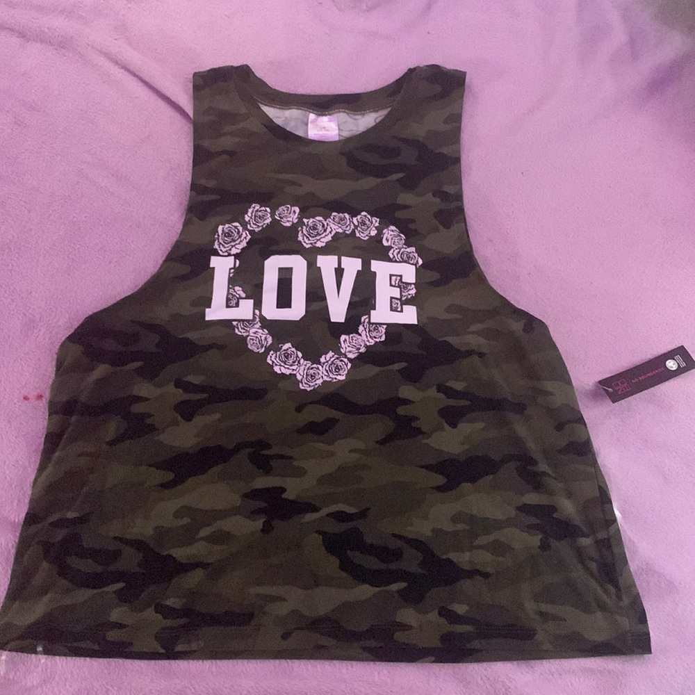 Camouflage tank top that says “love” on it